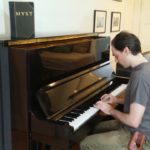 Cyan logo music played on the piano