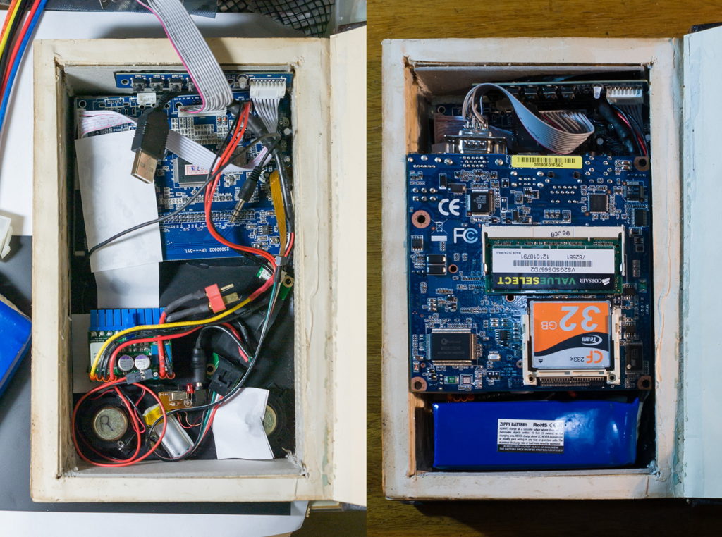 Two views inside the Myst book showing that it's completely filled with electronics